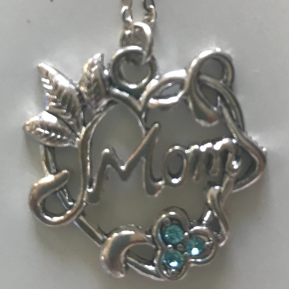 Silver mom necklace with topaz stone